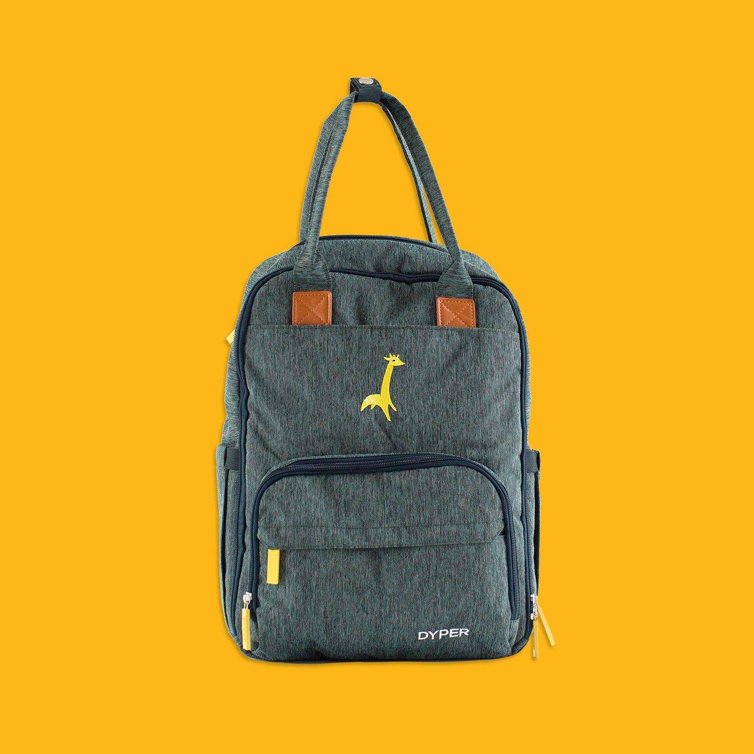 Green backpack with a yellow giraffe design on a yellow background